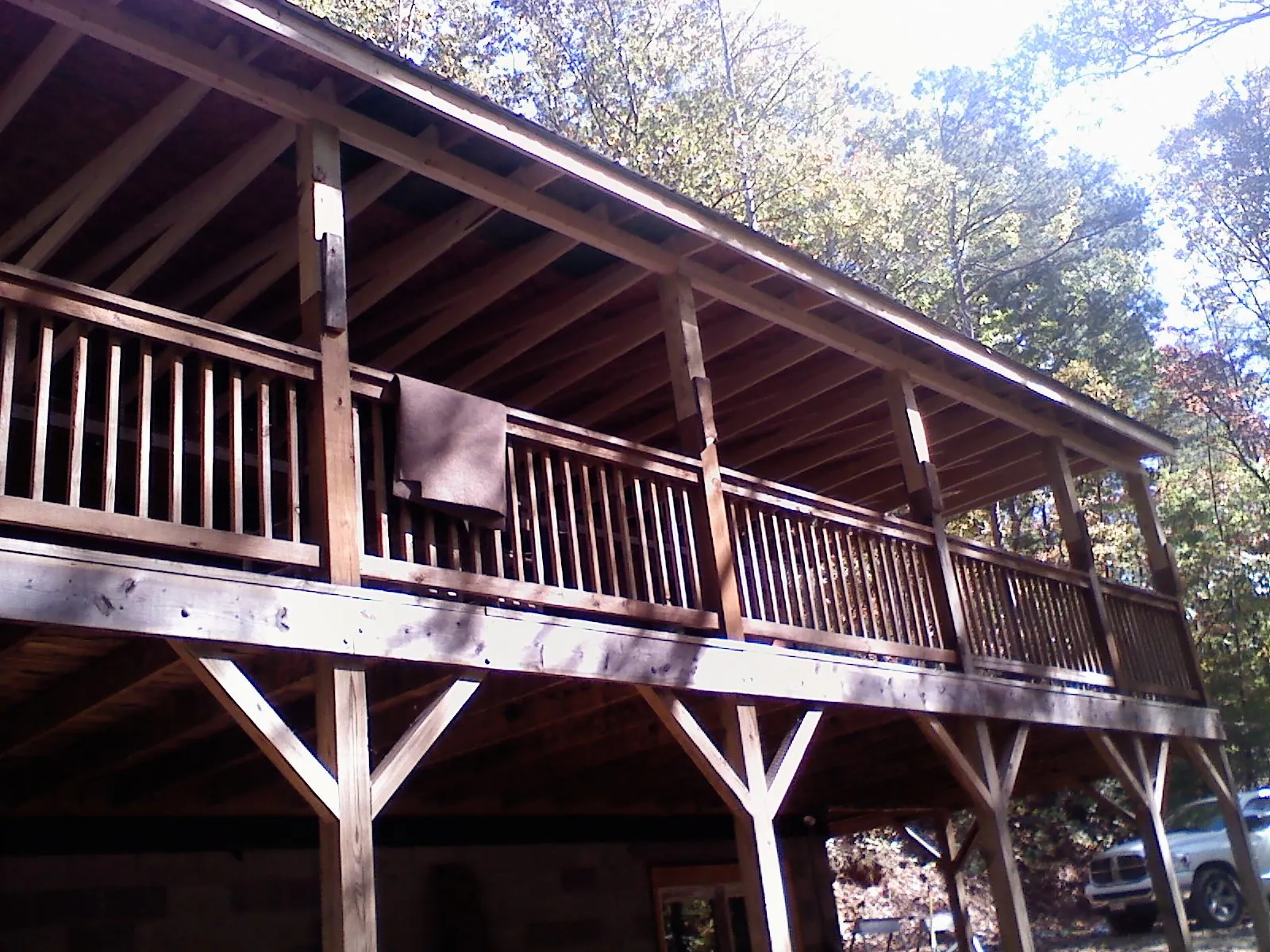 Timber framing under a new elevated porch and deck — Roof Leak Repair in Buford by Roofing Brothers